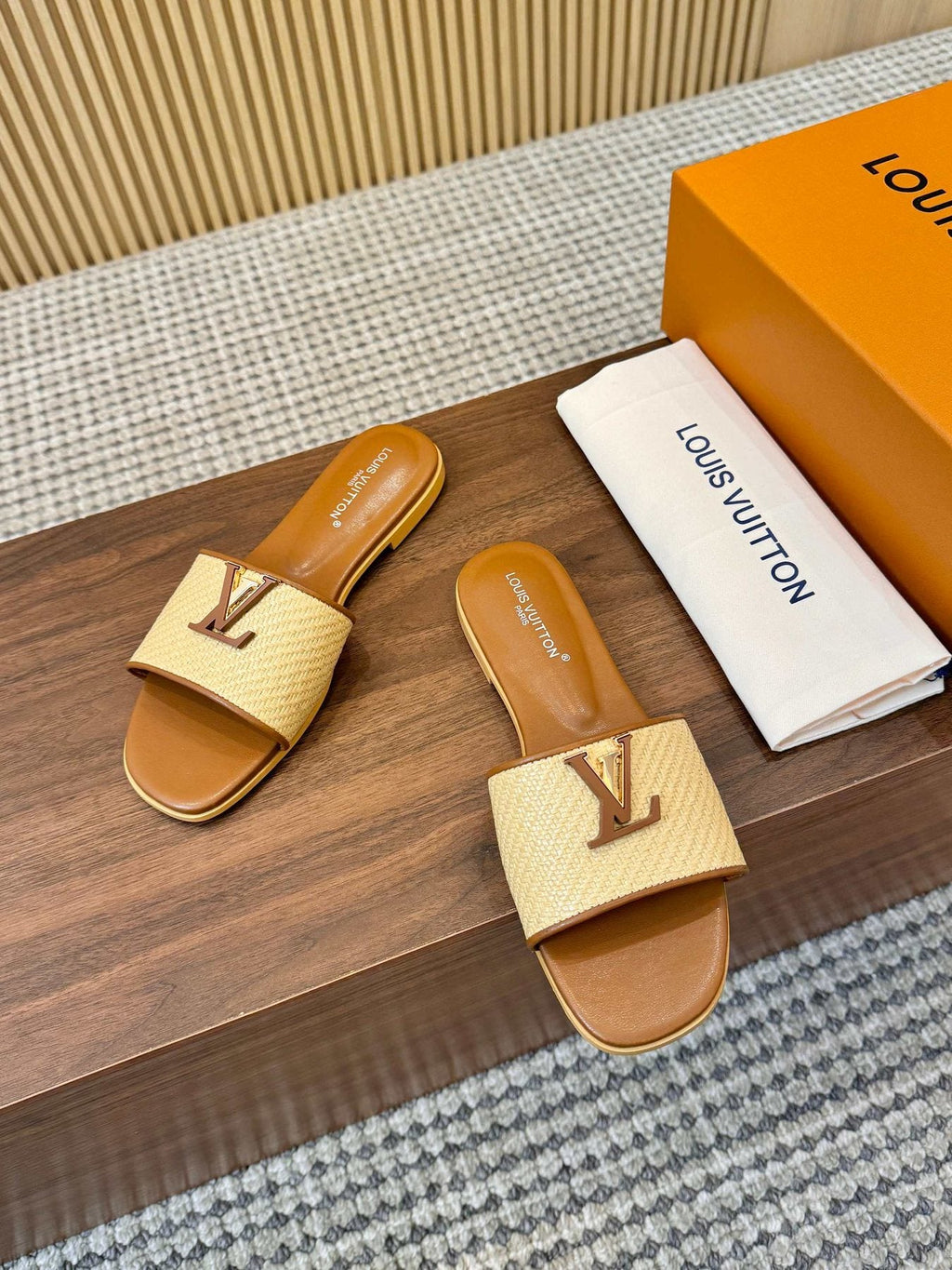 Louis Vuitton Textured Logo Slide Sandals — front