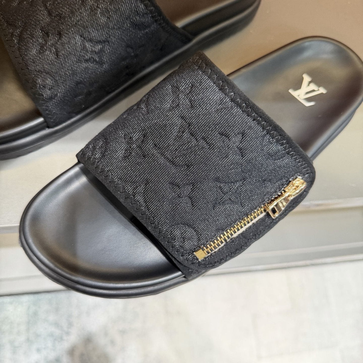 Louis Vuitton Embossed Zip Slide Sandals — detail